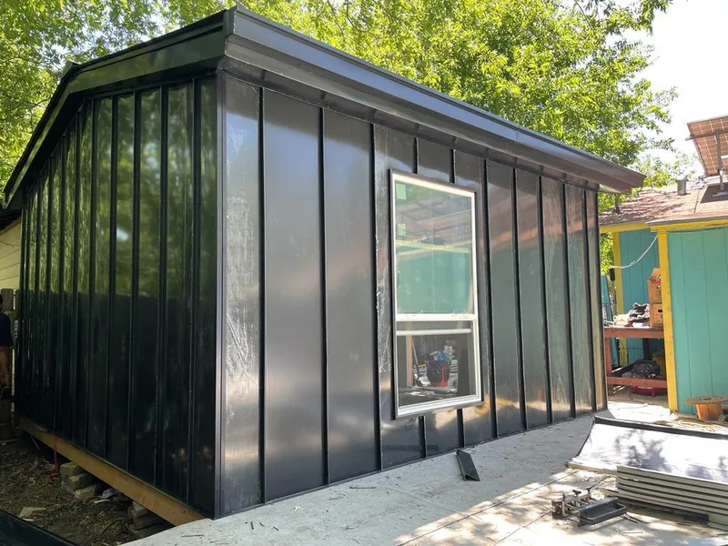 Black standing seam metal wall panels for Roof Inspection in Lenoir City